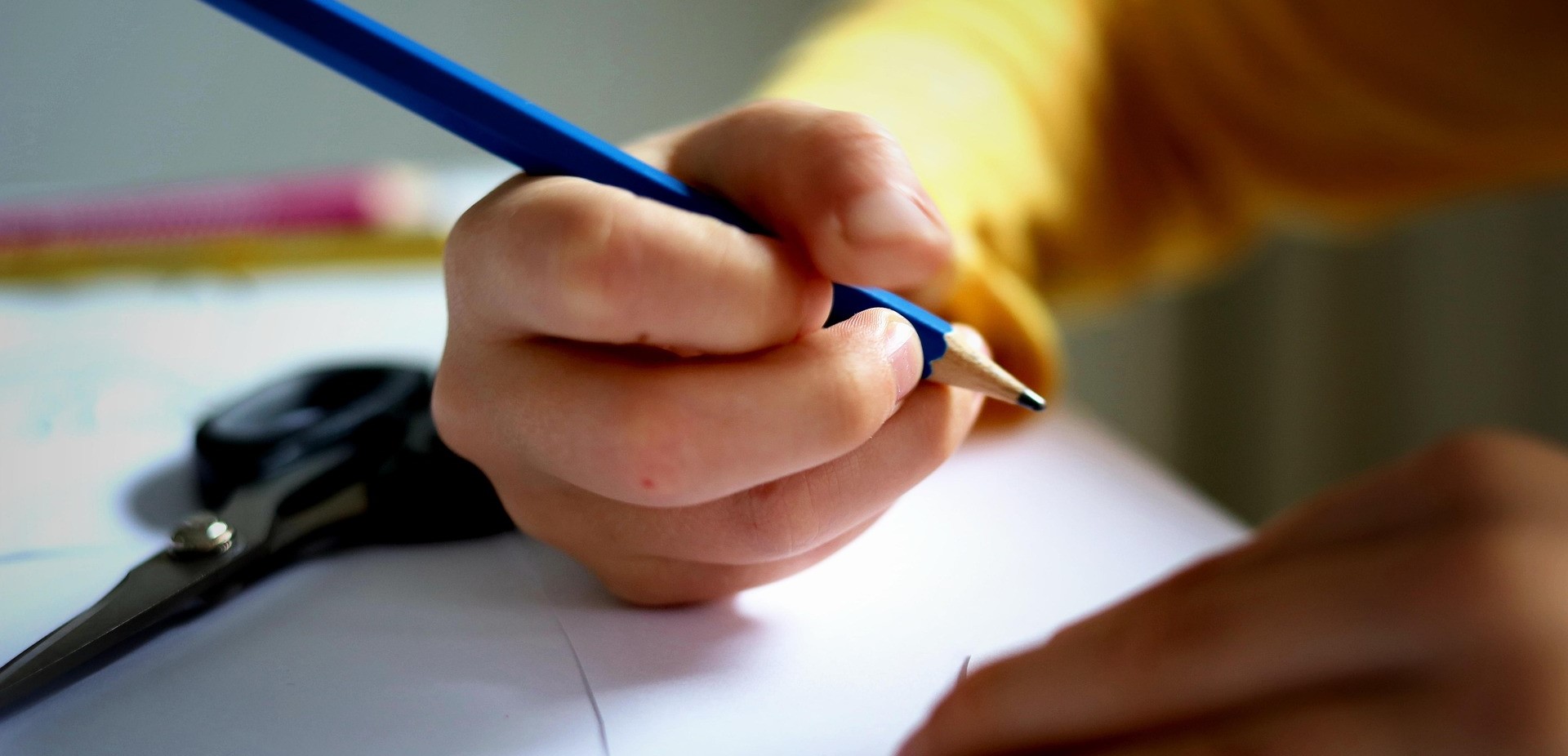 writing milestones by age image